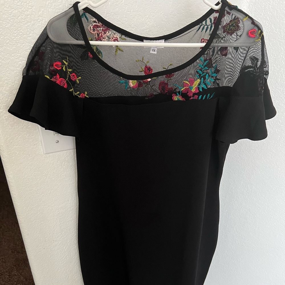 Little black dress with floral mesh
